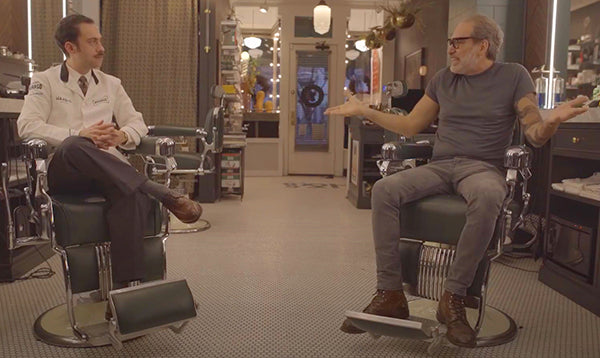 Mike and Frank talking in the barbershop