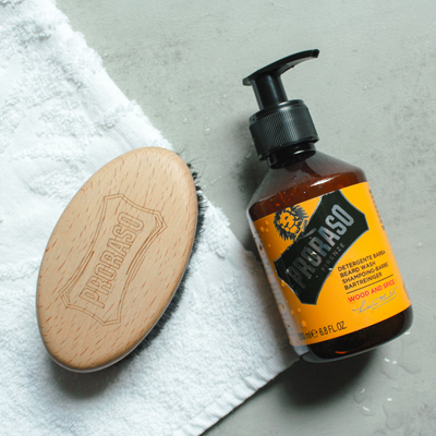Old Style Military Brush and Wood & Spice Beard Wash on white towel